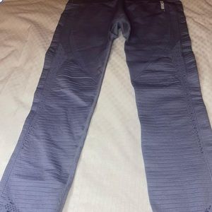 New, never worn, purple blue color , size small .